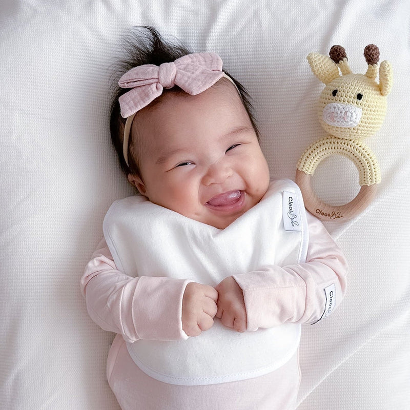 How to Handle Spit-Ups with the Right Reflux Baby Bib