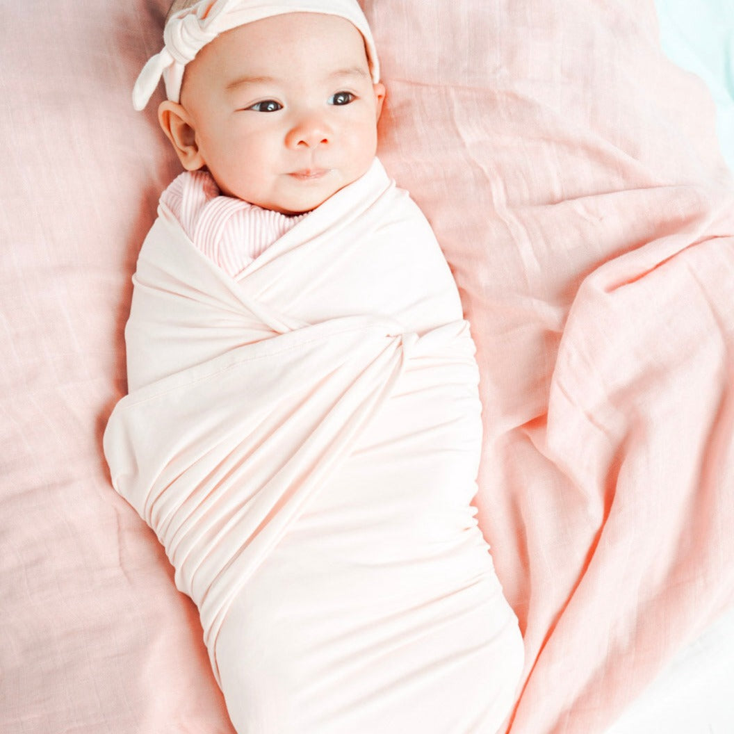 Stretchy Bamboo Baby Swaddle in Candy Pink