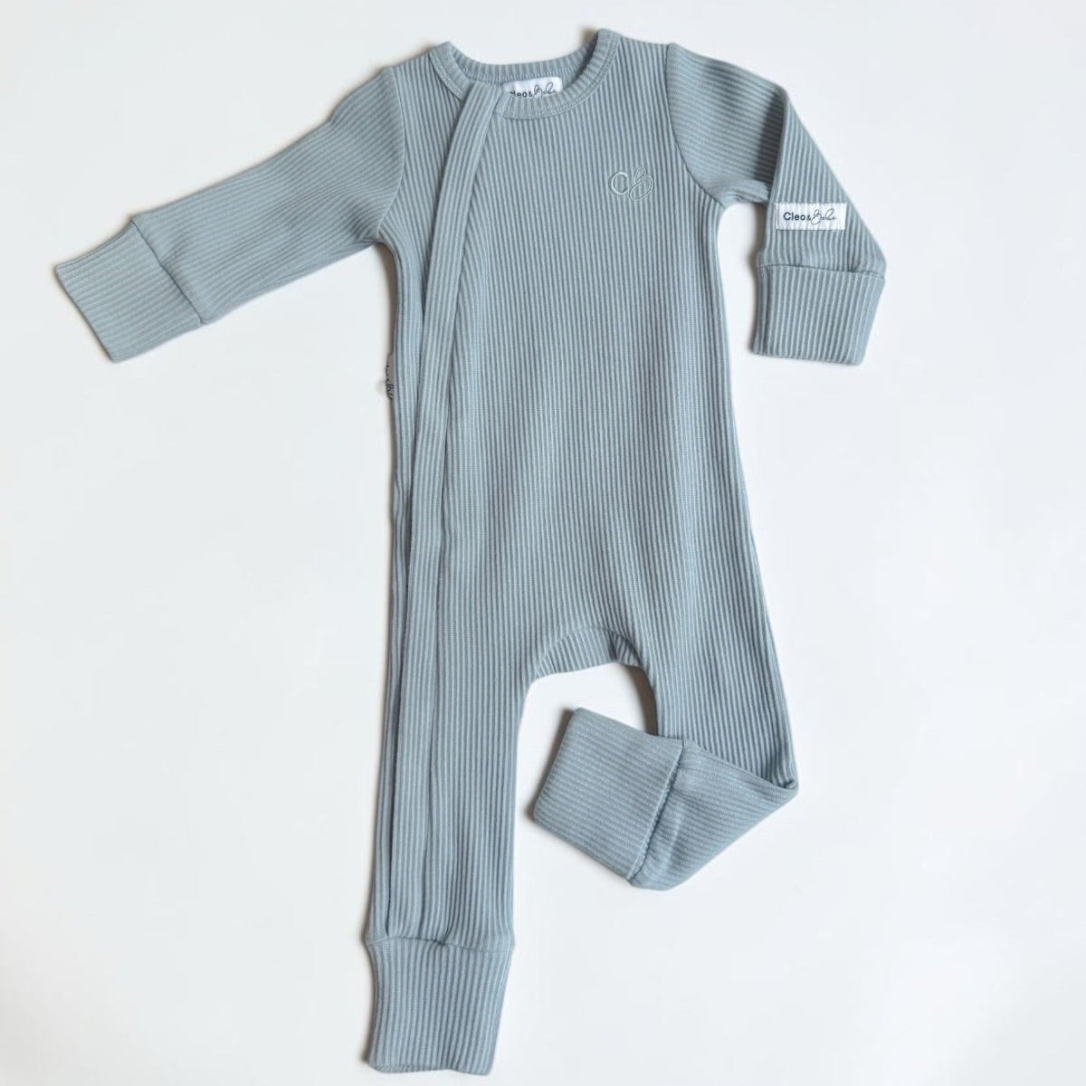 A baby long-sleeve ribbed footed sleeper in a dusty blue-gray color, laid flat on a white background.